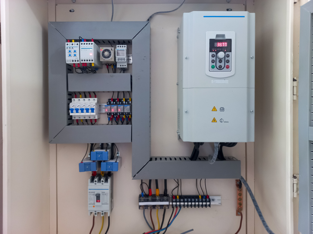Industrial electric motor and variable frequency drive controlling production equipment.