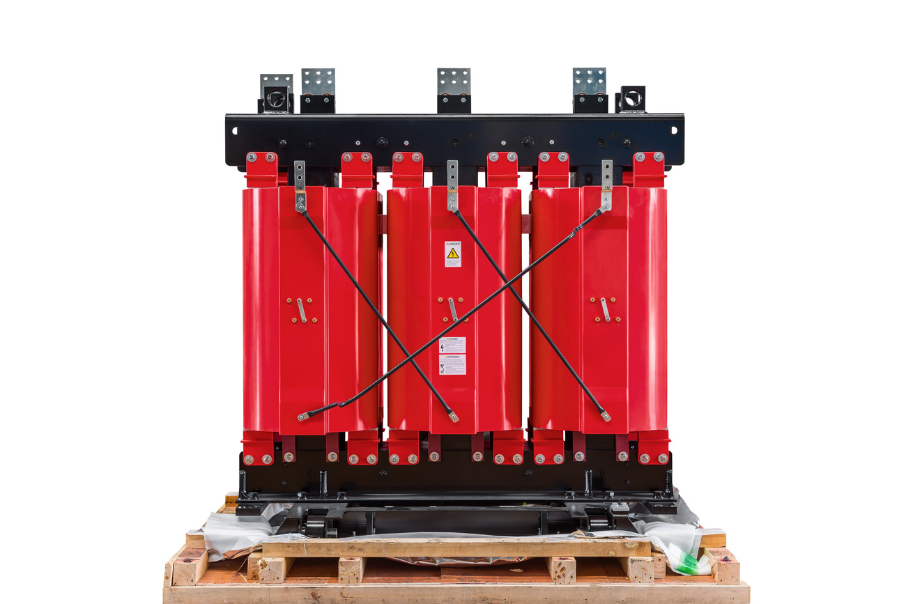 Dry-type transformer with exposed insulated windings in an industrial electrical installation